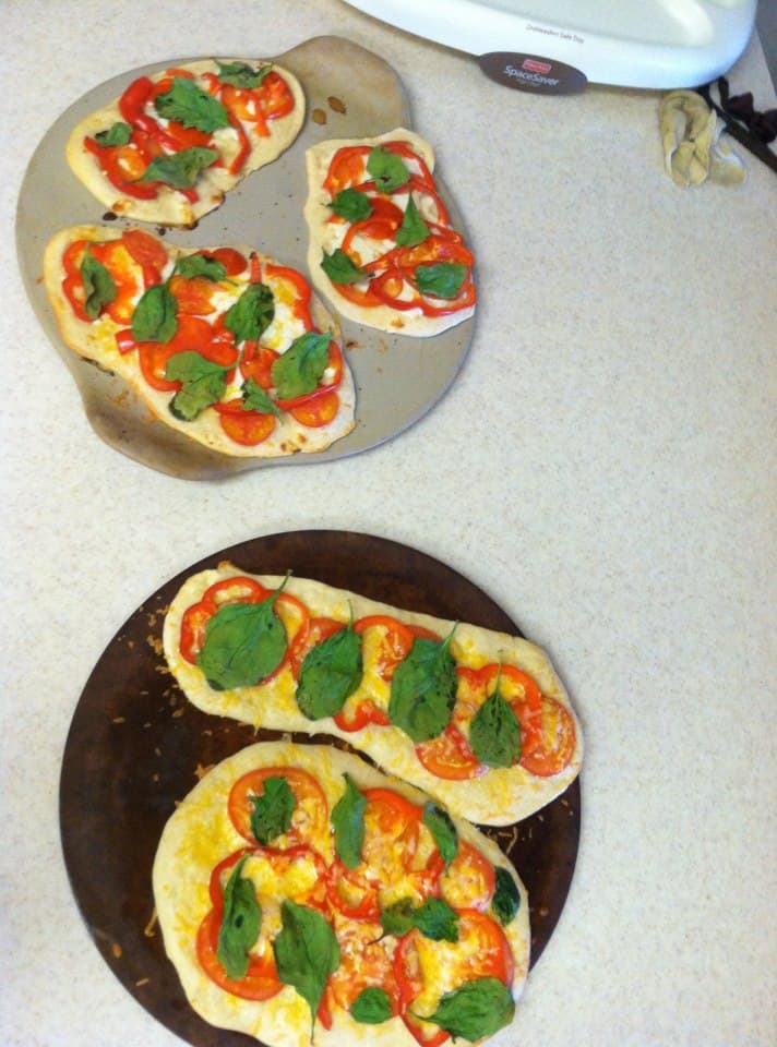 Greatest idea: teach the kids how to make pizzas with this easy personal pizza recipe that they can customize themselves!