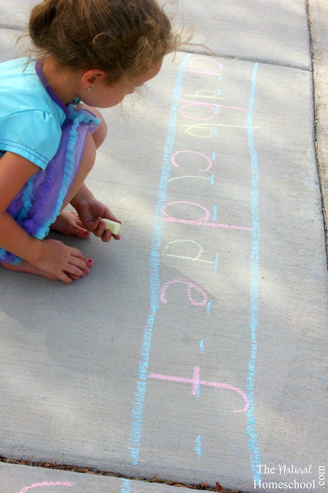 In this post, we will share with you some awesome sidewalk chalk ideas for early writing! My daughter enjoyed not only reviewing her alphabet letter names and sounds, but she also loved practicing writing the letters.
